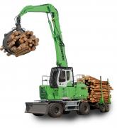SENNEBOGEN mobile forest machine 735E with wood in the trailer