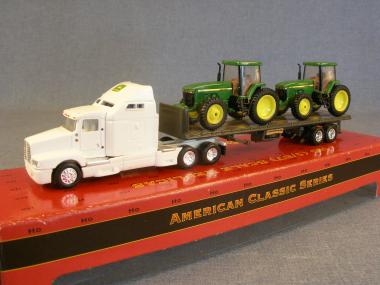 KENWORTH T600B with platform&JOHN DEERE tractor 8300 as loading 